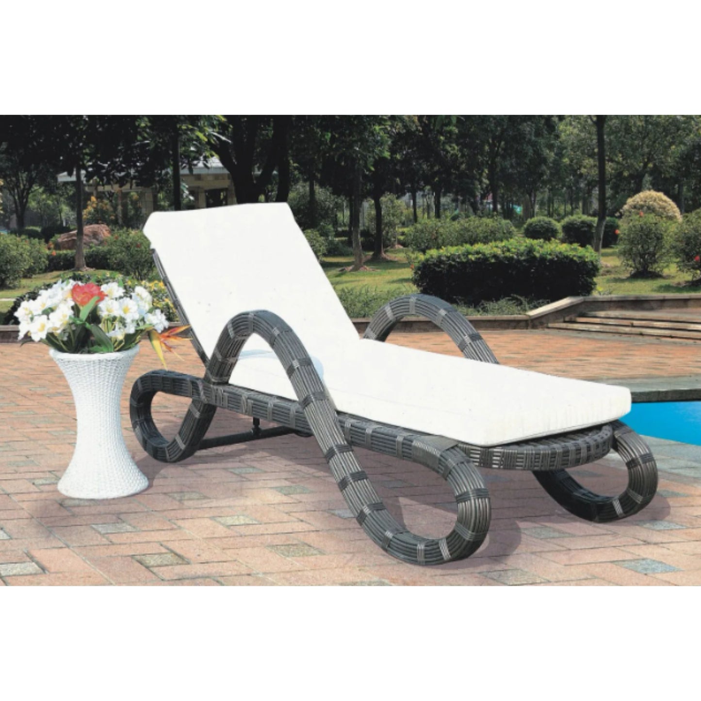 Elegant Woven Rattan Sun Lounger – Outdoor Recliner with Unique Curved Design