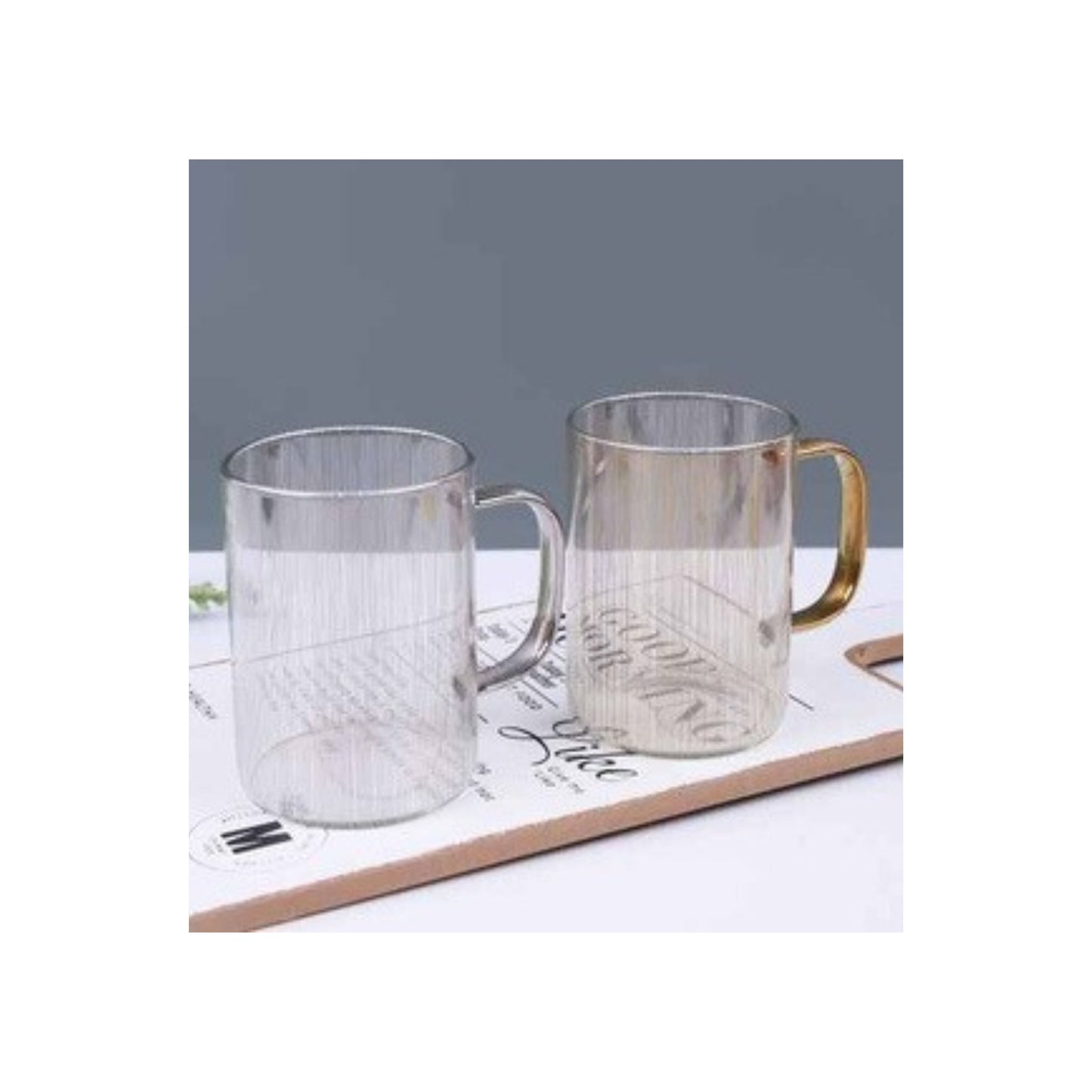 Glass mug with metallic edge and handle in silver or gold