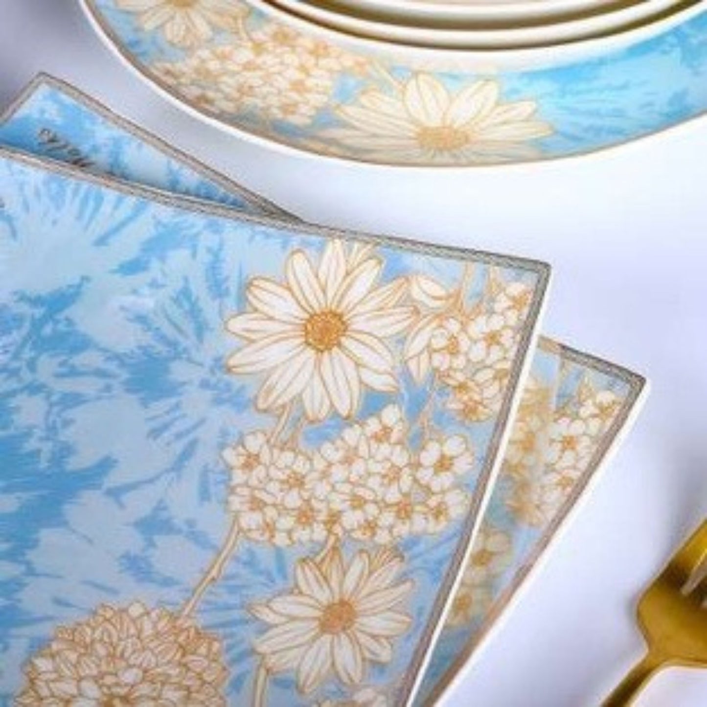 Time Stroll bone china crockery set with light blue design and white flowers