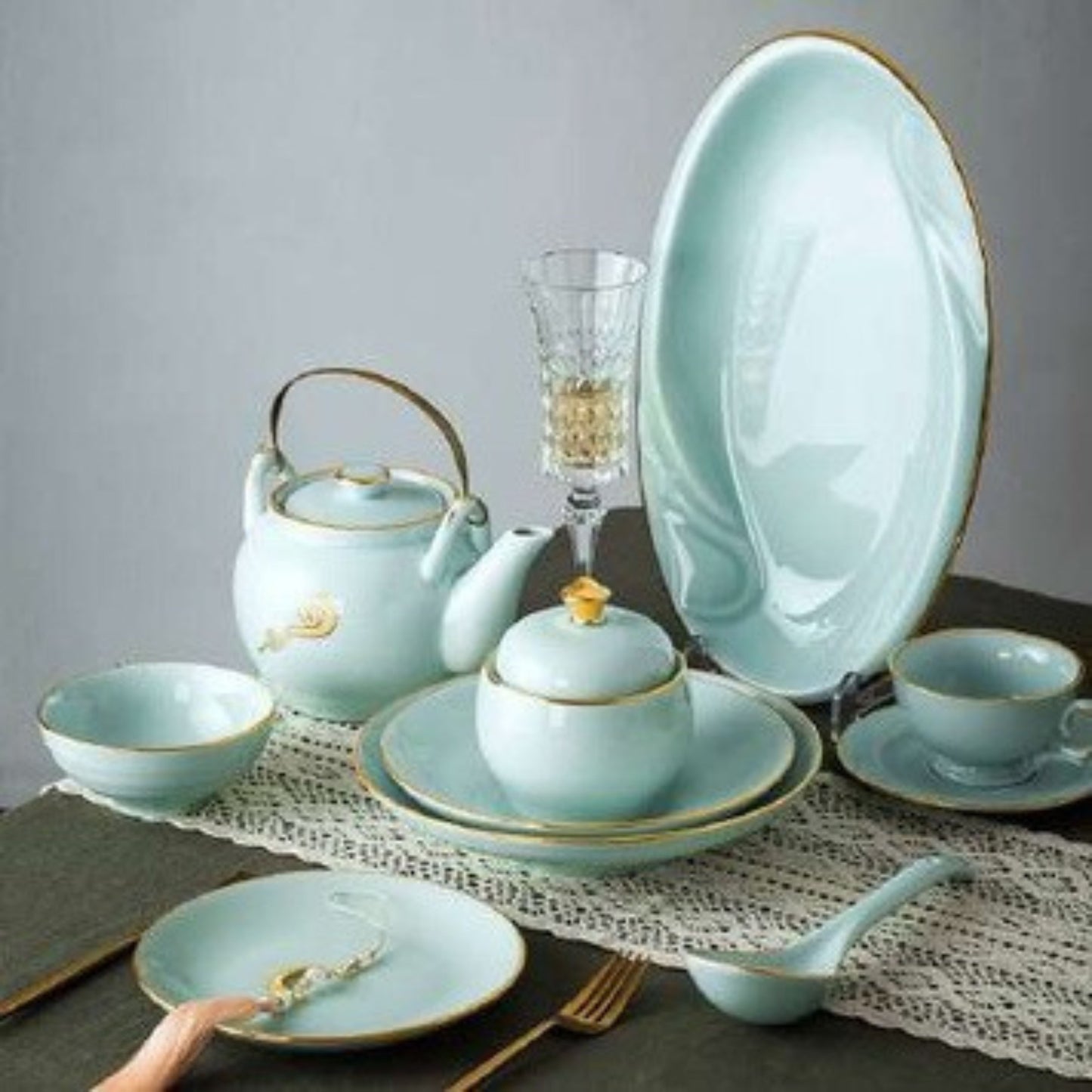 Celadon Elegance high white porcelain crockery set in light blue with golden edges