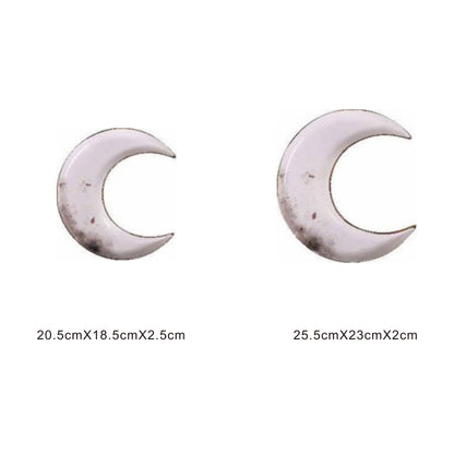 White ceramic crescent moon plate with golden edges and shiny surface