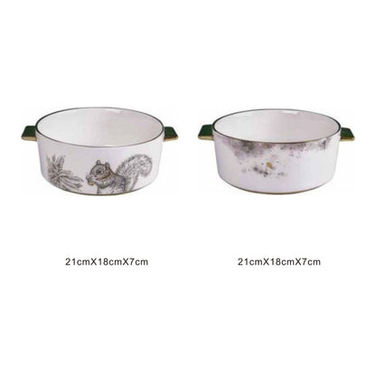 White ceramic serving dish with moon pattern or animal face, golden edges, and shiny surface
