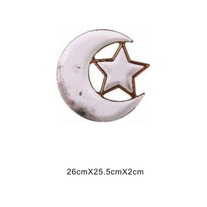 White ceramic crescent moon plate with star, golden edges, and shiny surface