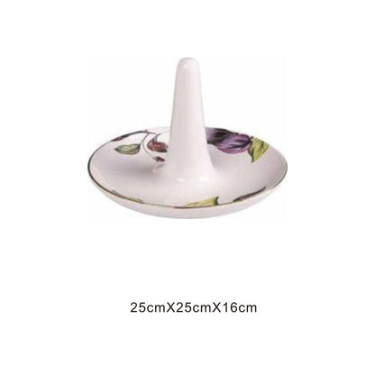 White ceramic animal-face bowl with golden edges and shiny surface