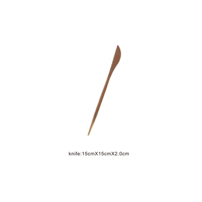 Golden stainless steel cutlery set – knife, fork, and spoon
