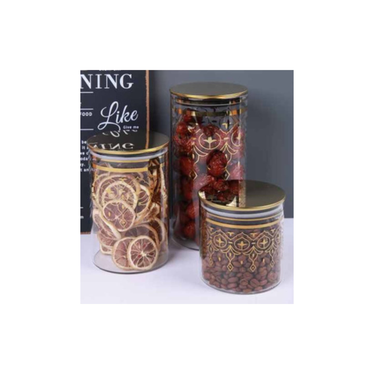 Glass jar with golden lid and assorted decorative patterns