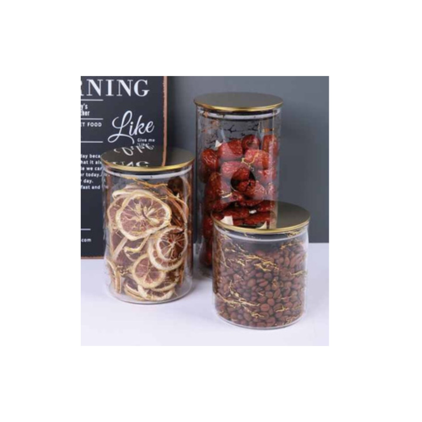 Glass jar with golden lid and assorted decorative patterns