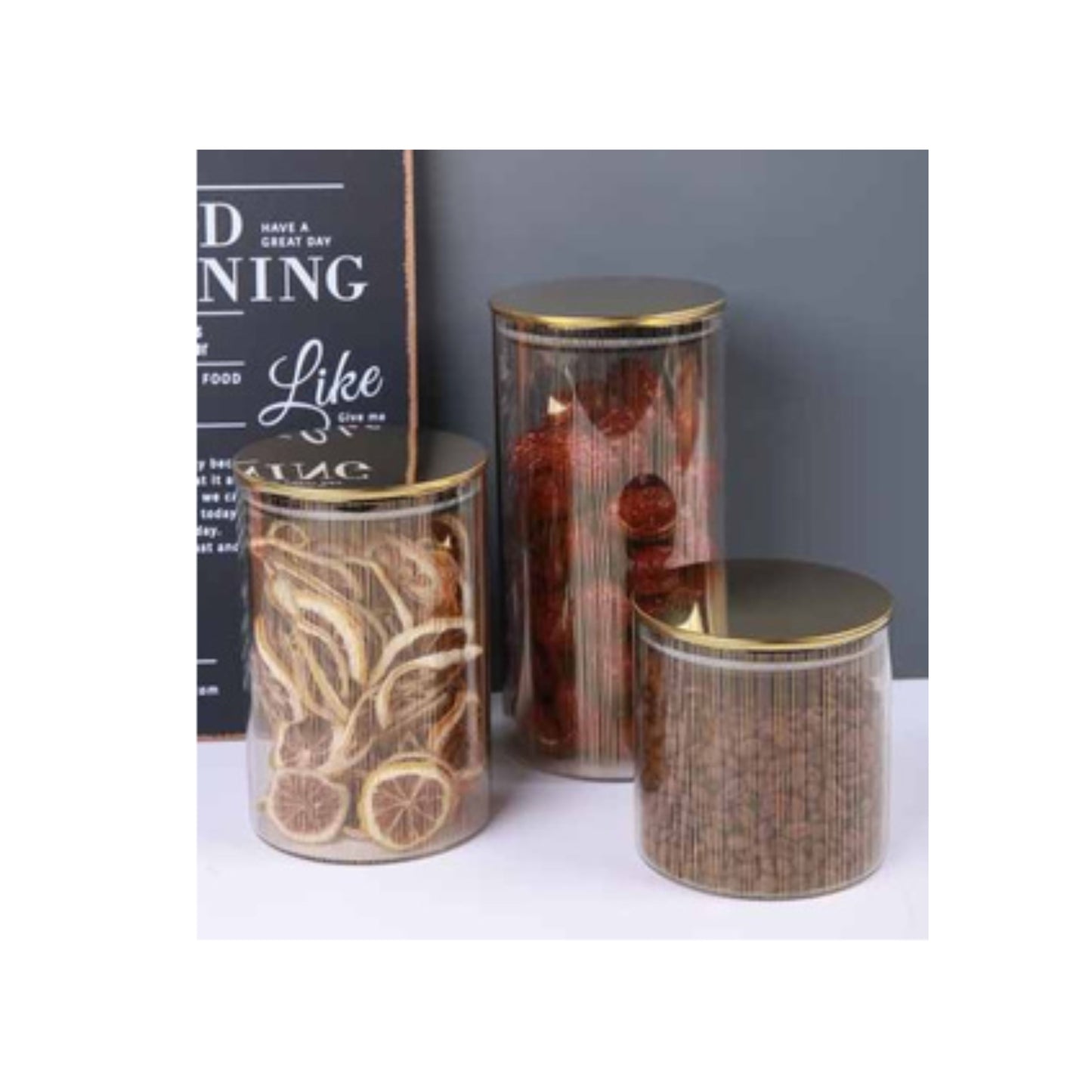 Glass jar with golden lid and assorted decorative patterns