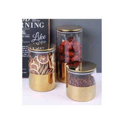 Glass jar with golden lid and assorted decorative patterns