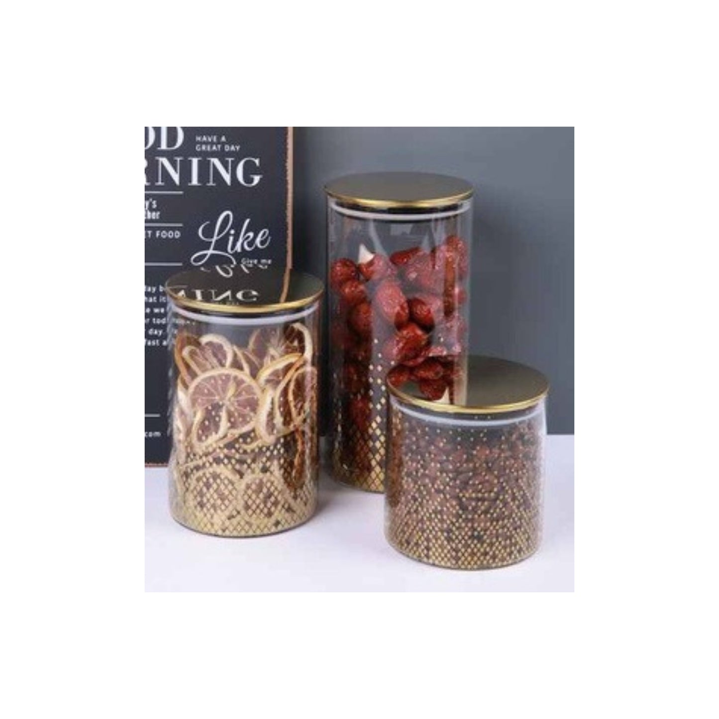 Glass jar with golden lid and assorted decorative patterns