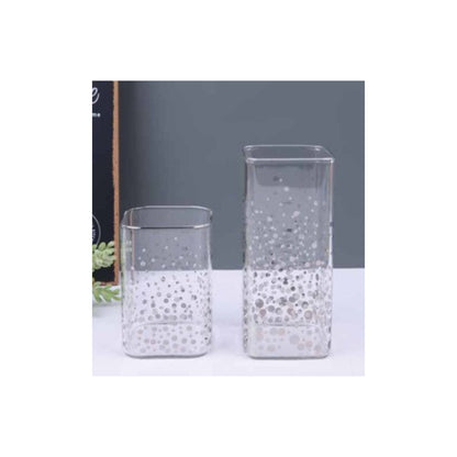 Glass jar with metallic detailing in silver or gold and assorted patterns