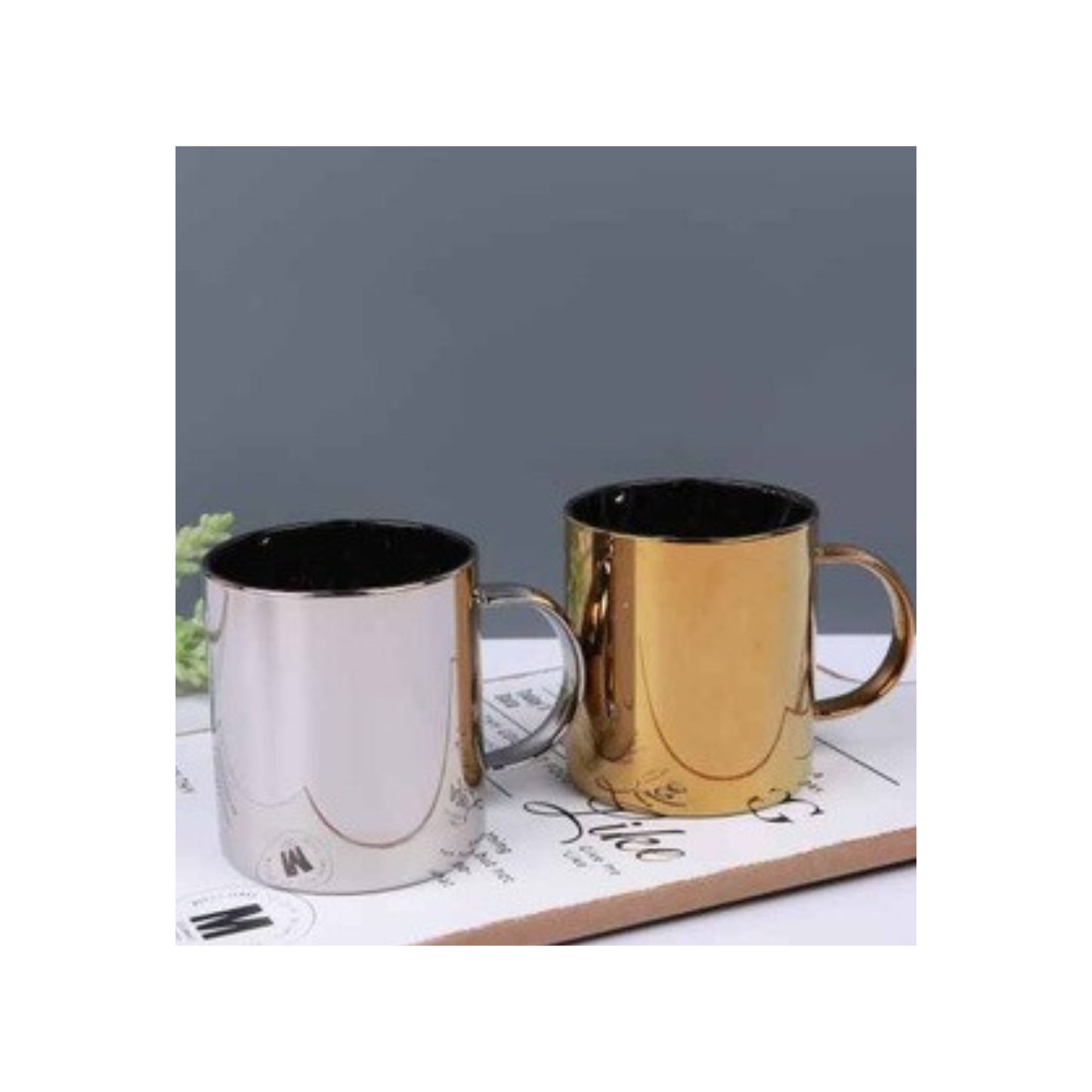 Glass mugs with solid silver and golden color finishes