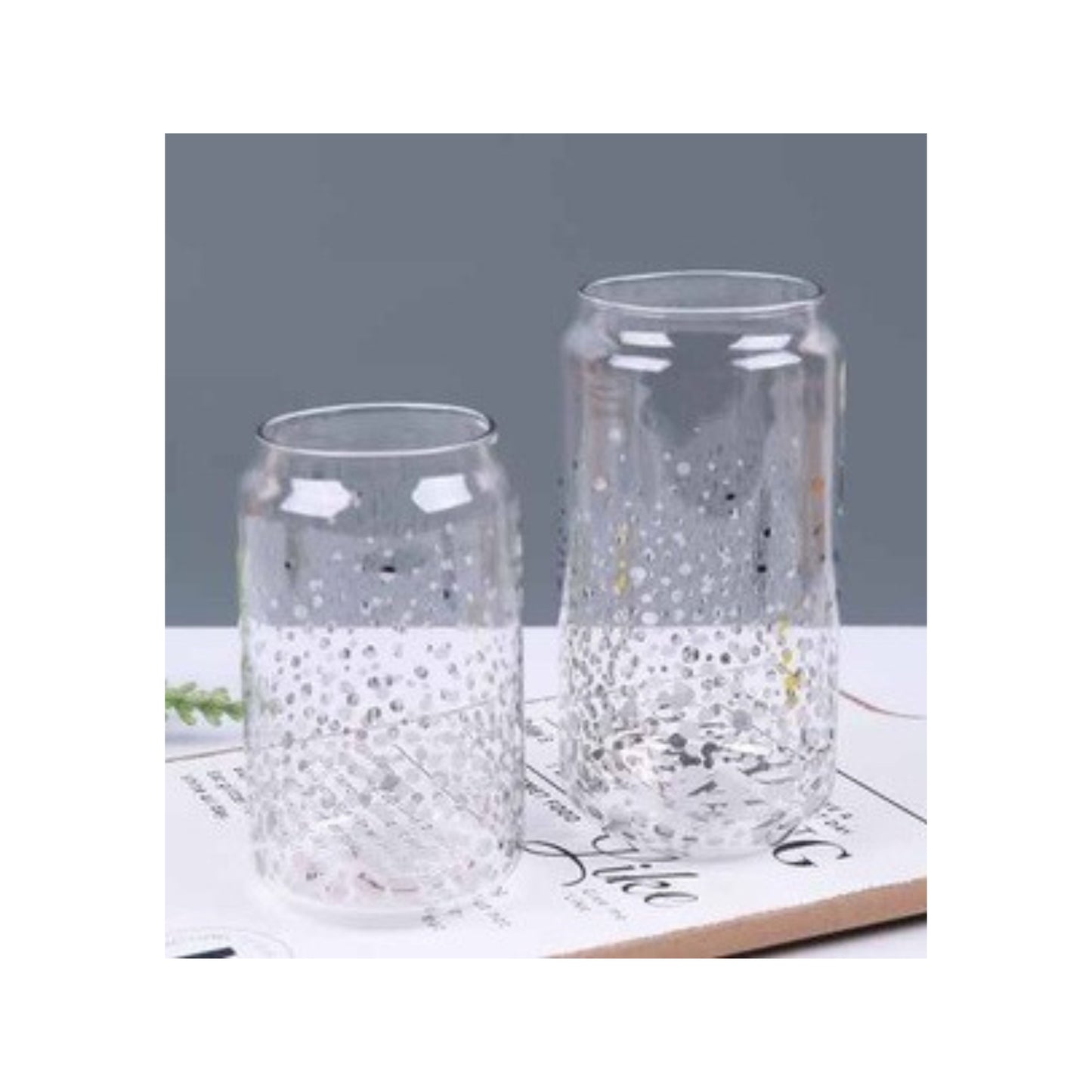 Glass with black marble or dotted pattern in silver and gold variations