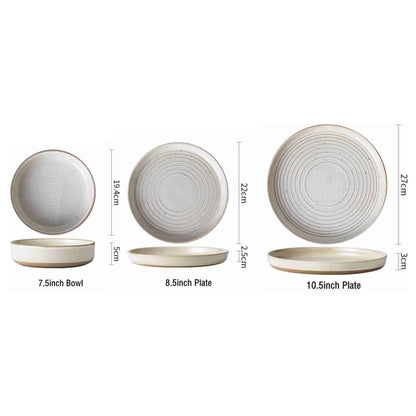 Round stoneware plates with engraved circle line pattern
