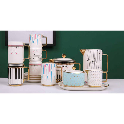 White Ceramic Tea and Coffee Set with Colorful Lines, Piano Keys, Smiley Pattern, Golden Edges, and Shiny Surface – 13-Piece Collection