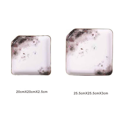 White ceramic square tray with moon pattern, golden edges, and shiny surface