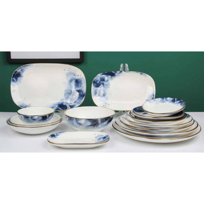 White Ceramic Dinnerware Set with Blue Smokey Effect and Shiny Surface – 14-Piece Collection