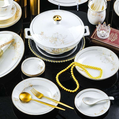 Golden Lily bone china crockery set with floral pattern and golden edges