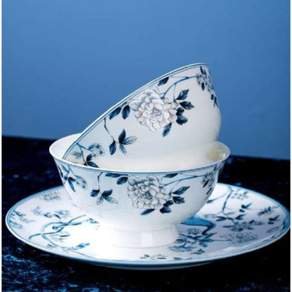 Blue Peacock bone china crockery set with peacock, leaves, and vine motif