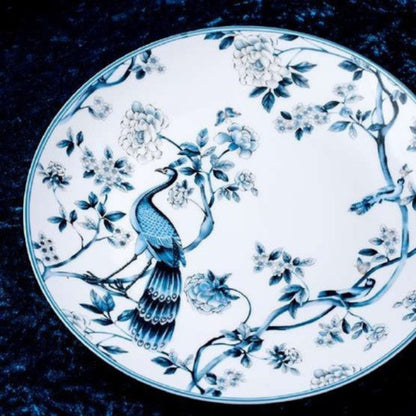 Blue Peacock bone china crockery set with peacock, leaves, and vine motif