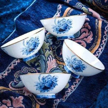 Sheng He Blue Rhythm bone china crockery set with blue floral background and white flowers