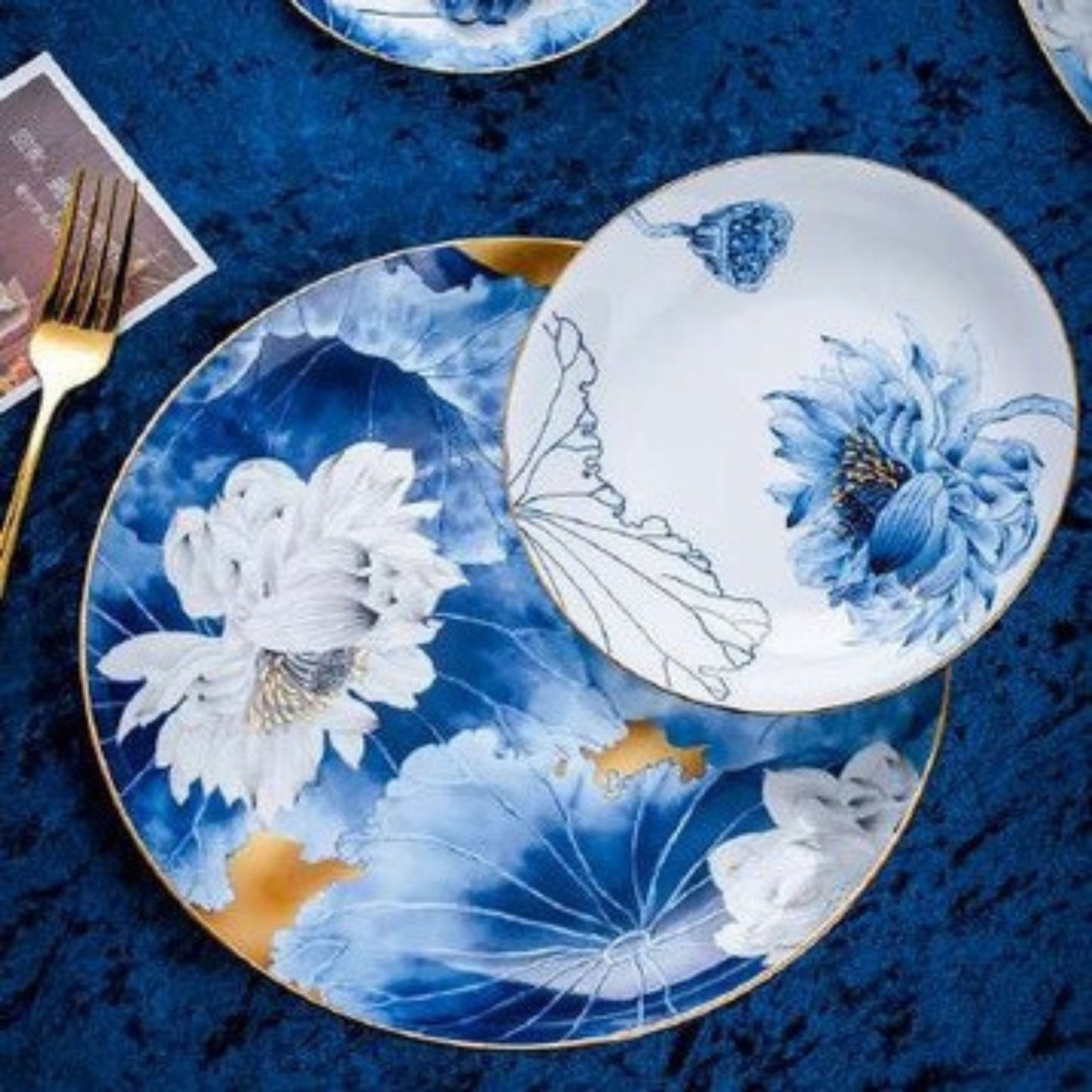 Sheng He Blue Rhythm bone china crockery set with blue floral background and white flowers