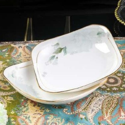 Verdant Elegance bone china crockery set with green leaves motif and golden edges