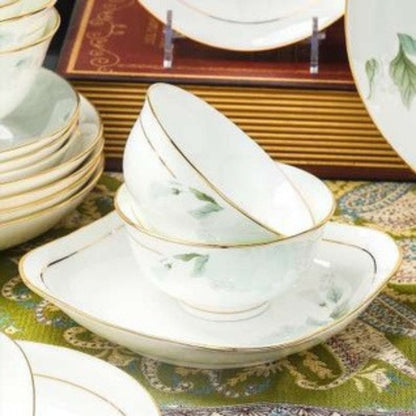 Verdant Elegance bone china crockery set with green leaves motif and golden edges