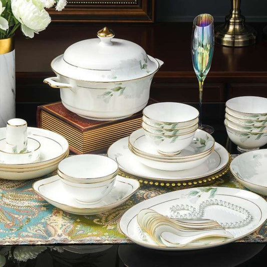 Verdant Elegance bone china crockery set with green leaves motif and golden edges