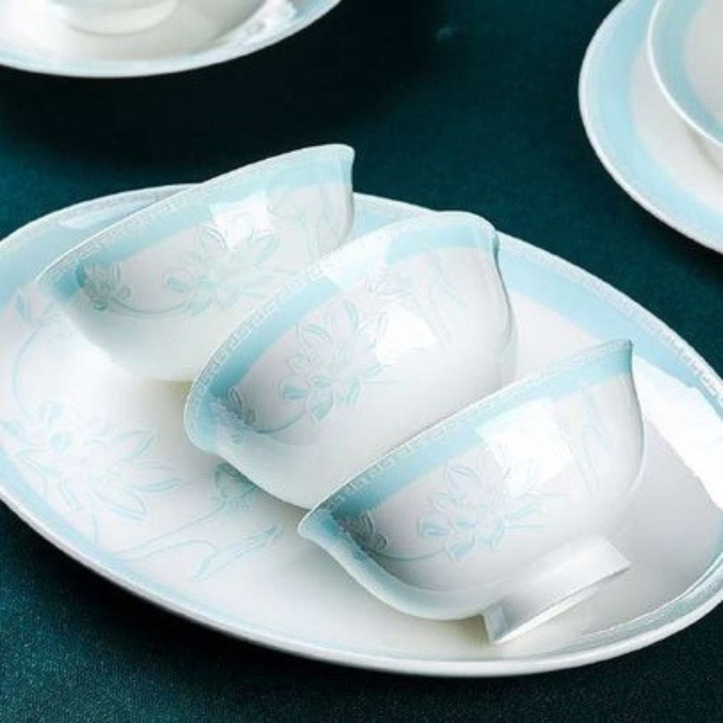 Lotus Pond Moonlight bone china crockery set with simple light blue floral design
