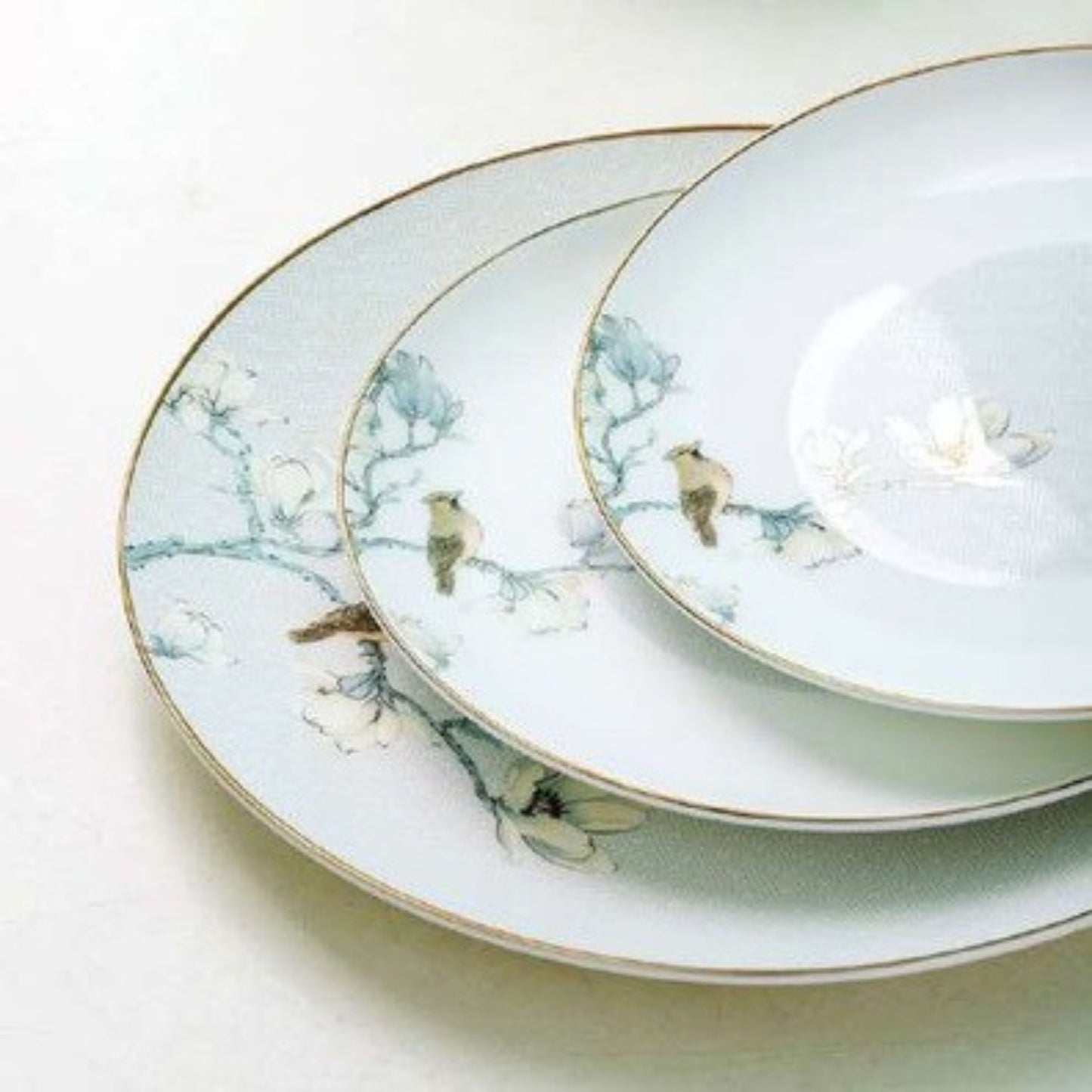 Birdsong & Blossoms bone china crockery set with white and blue floral design