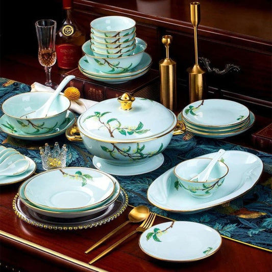Golden Autumn Osmanthus porcelain crockery set with light blue base and green leaves and branches design
