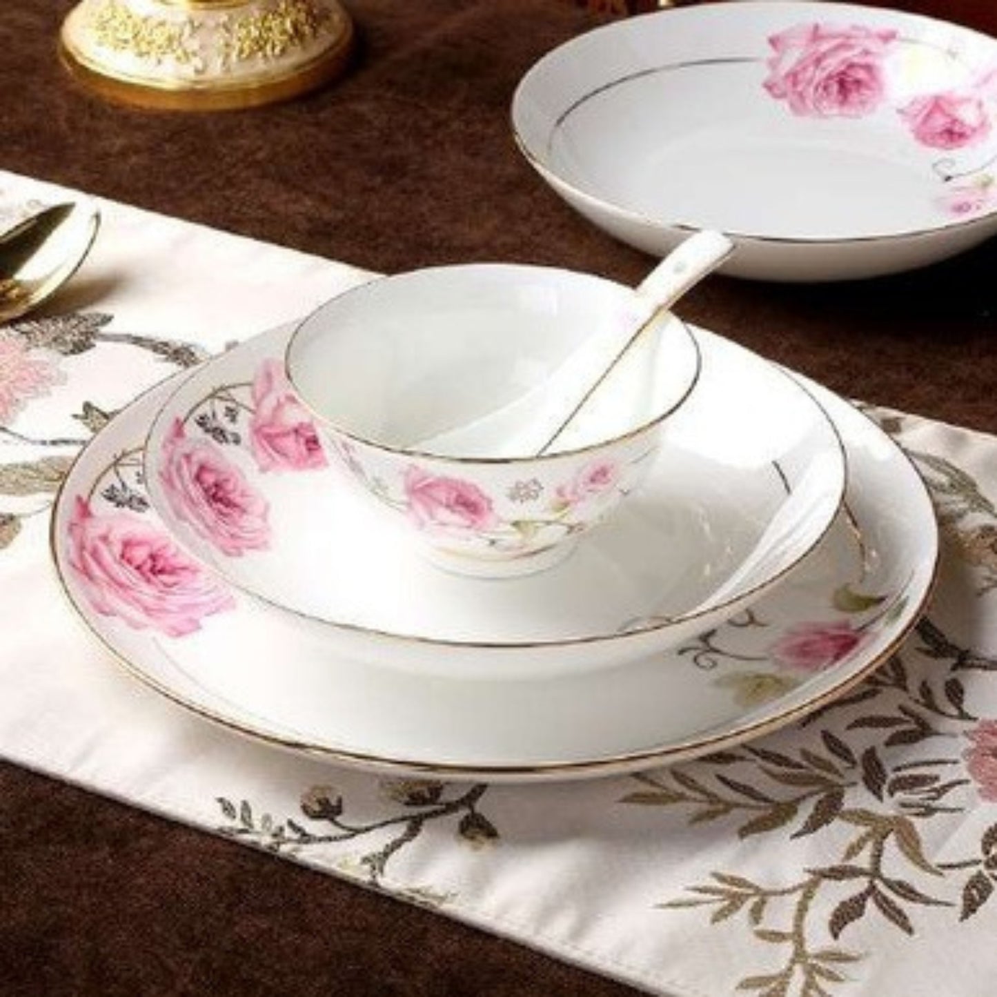 Blushing Beauty bone china crockery set with pink flower design and golden edges