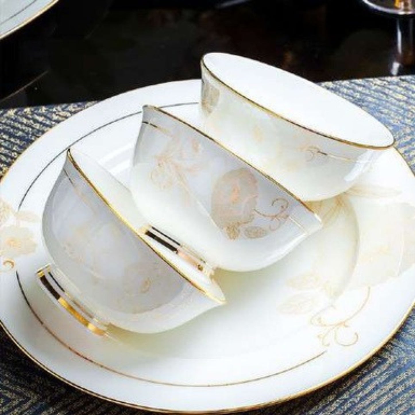 Radiant Bloom bone china crockery set with golden floral design and golden edges