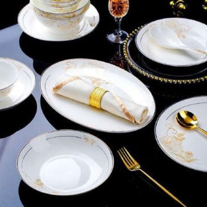Starry World bone china crockery set with golden floral design and golden edges