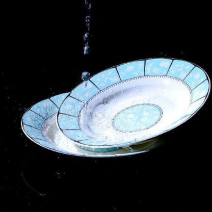 Little Era bone china crockery set with light blue floral design